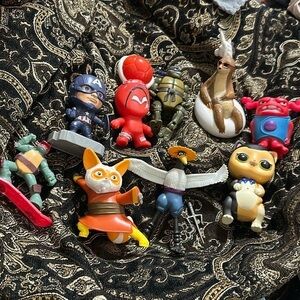 Captain America, kung fu panda characters, ninja Turtles, and other toys
